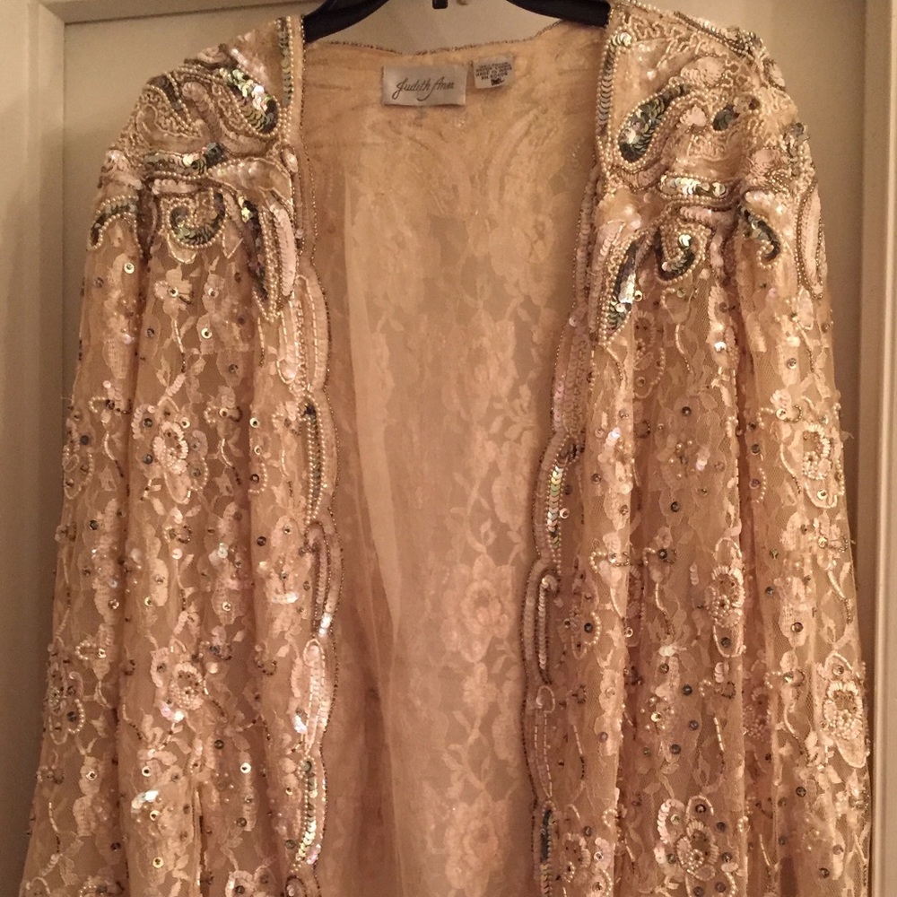 Glitzy evening jacket.  Brand is Judith Ann.